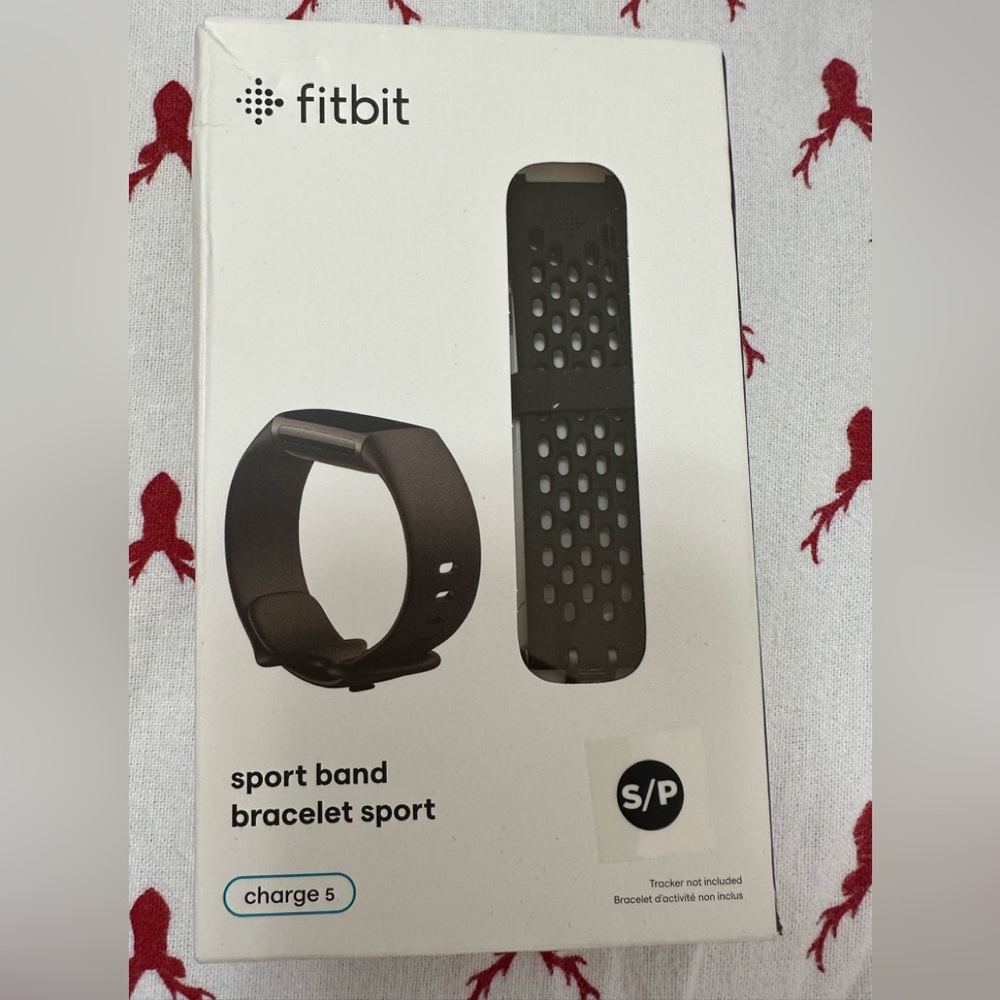 Fit bit NWT sports band charge 5 and fits Lux